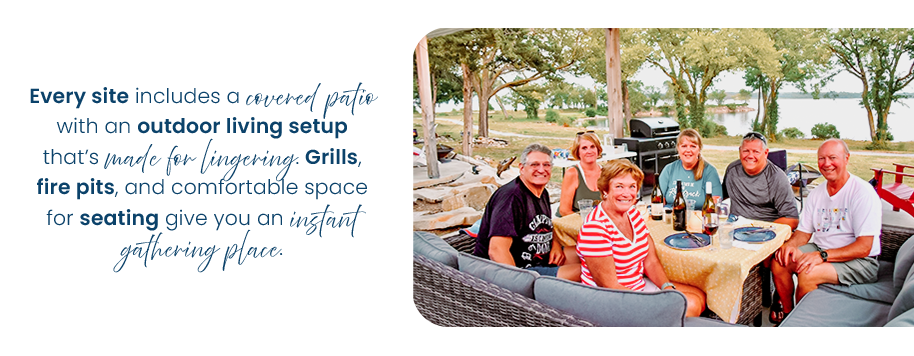 Group of friends on a covered patio having dinner in their outdoor living space where they have a grill, firepit, and seating.